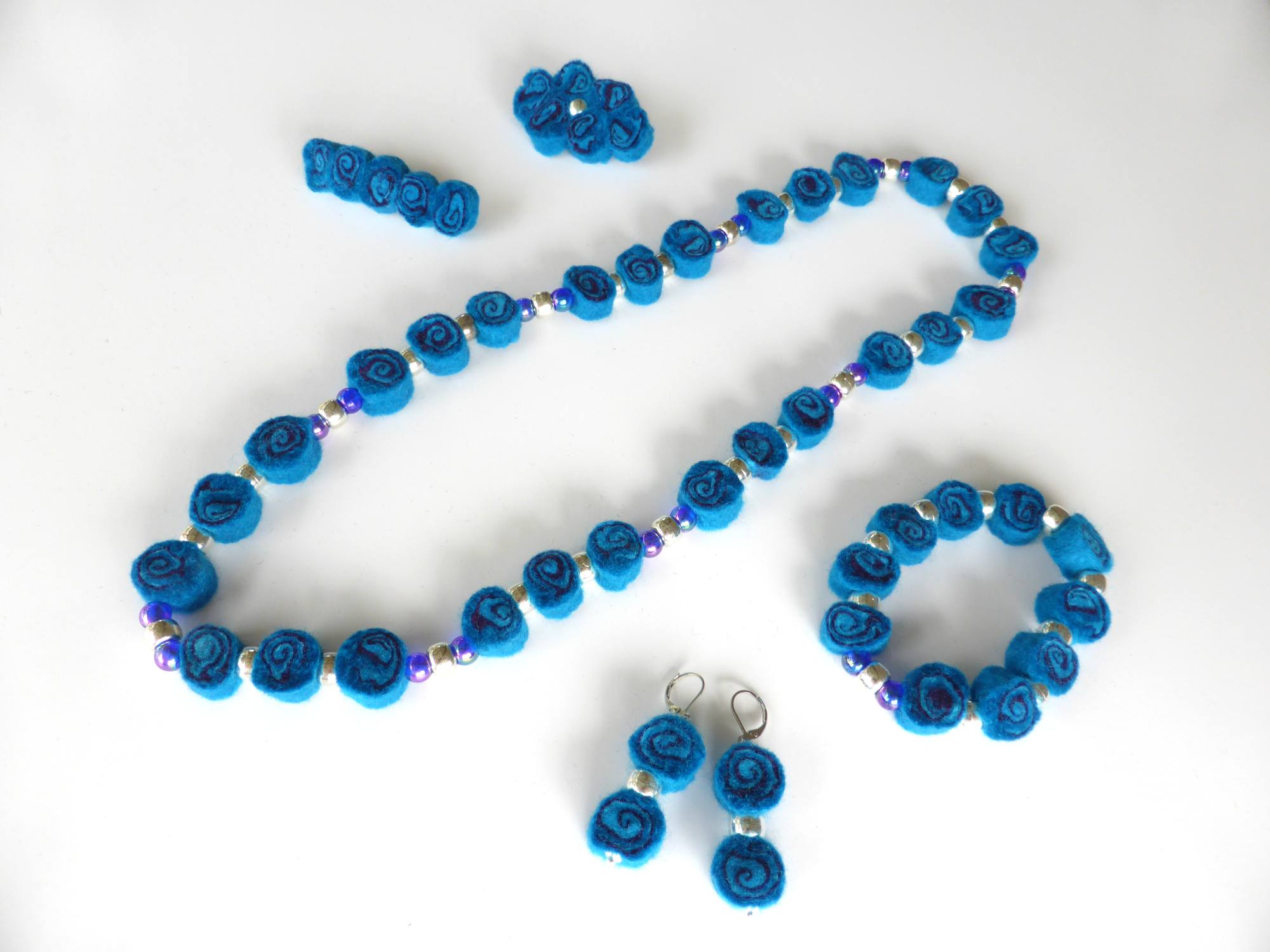 Blue Felt Spiral Jewellery by Andrea McCallum
